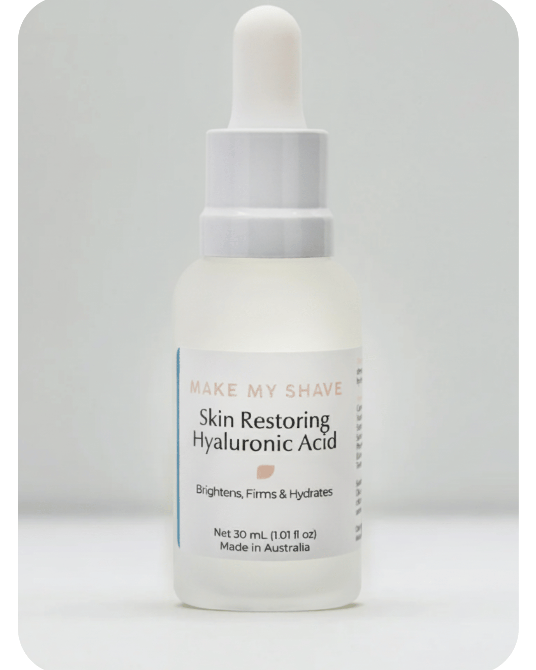 Skincare dropper bottle labeled 'Hyaluronic Acid Make My Shave' on a white background