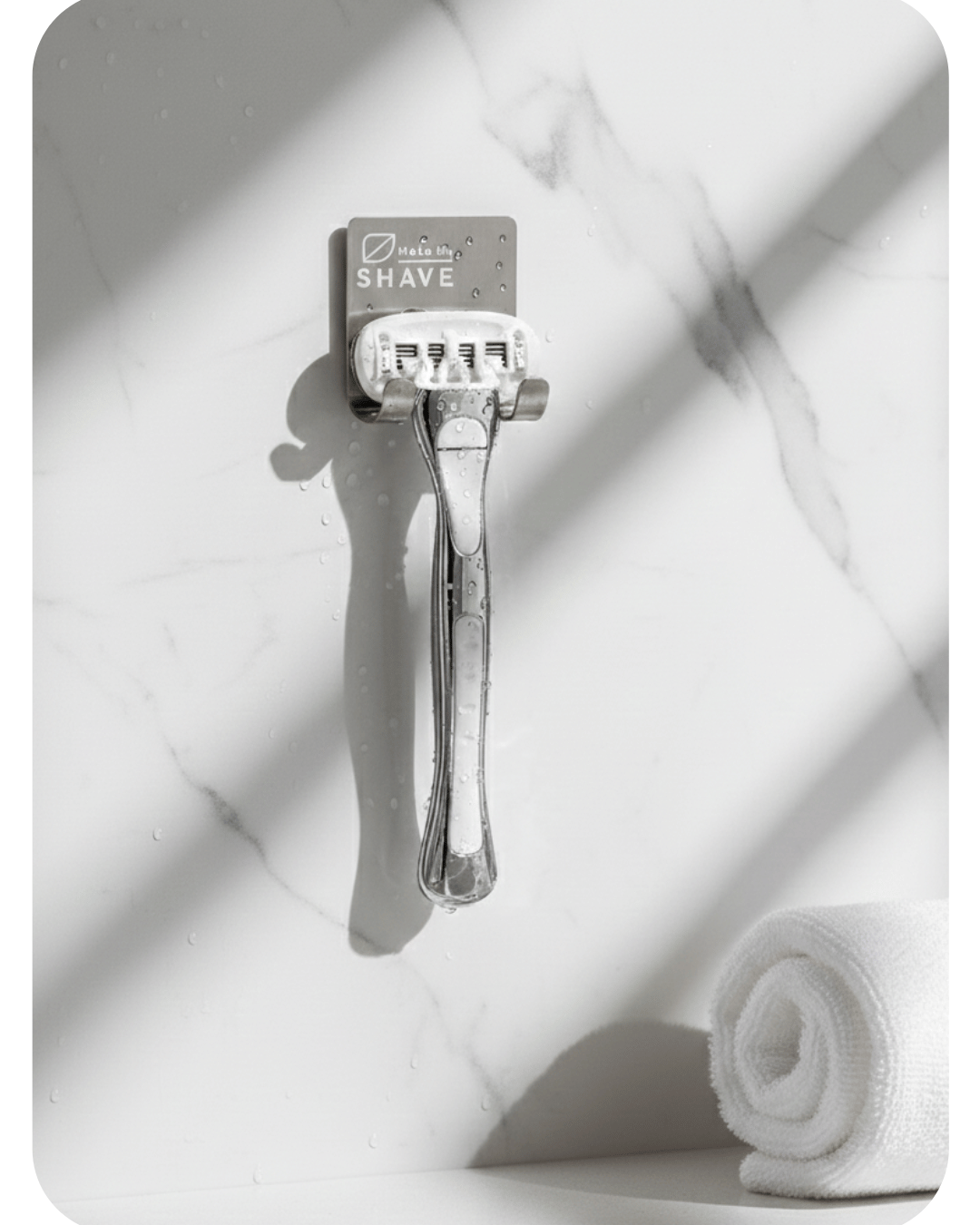 Women's razor on an in-shower razor hold with white background